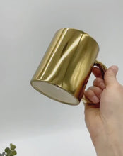 Load and play video in Gallery viewer, Metallic Gold Sublimation Mug
